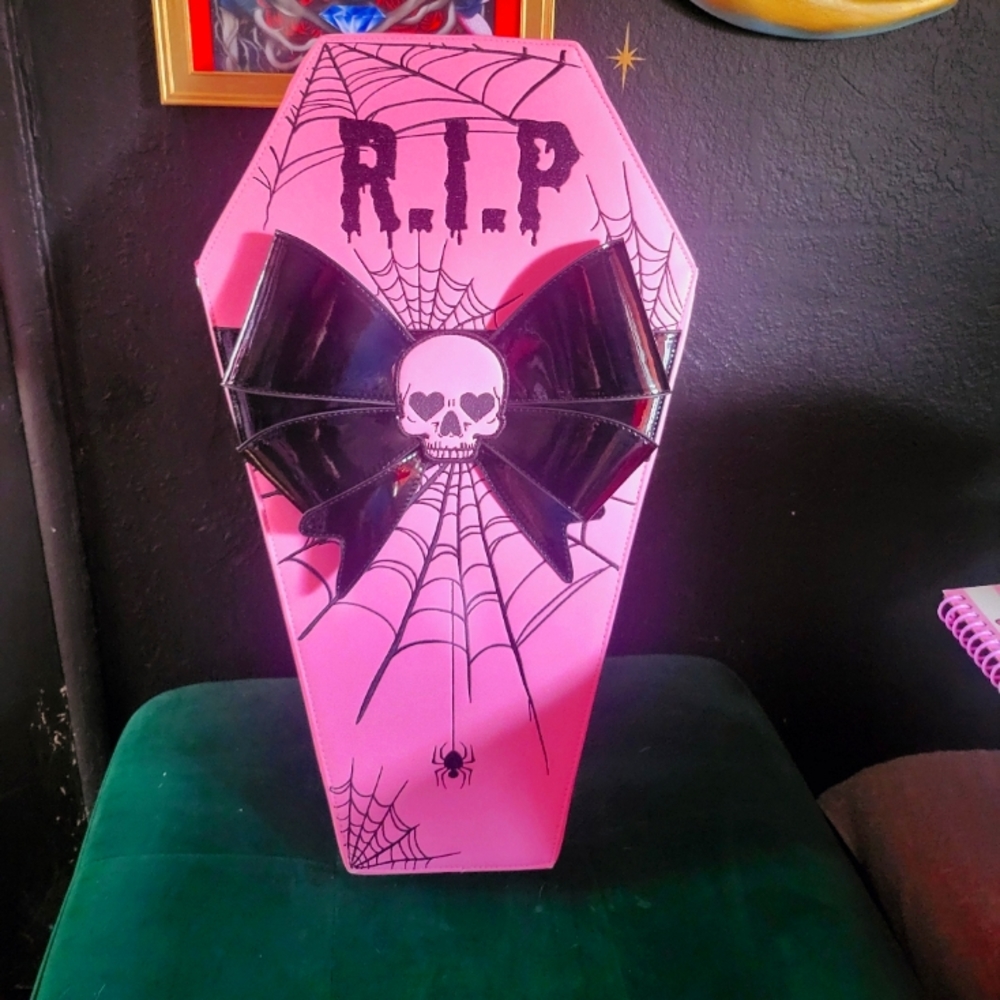 Dollskill coffin backpack